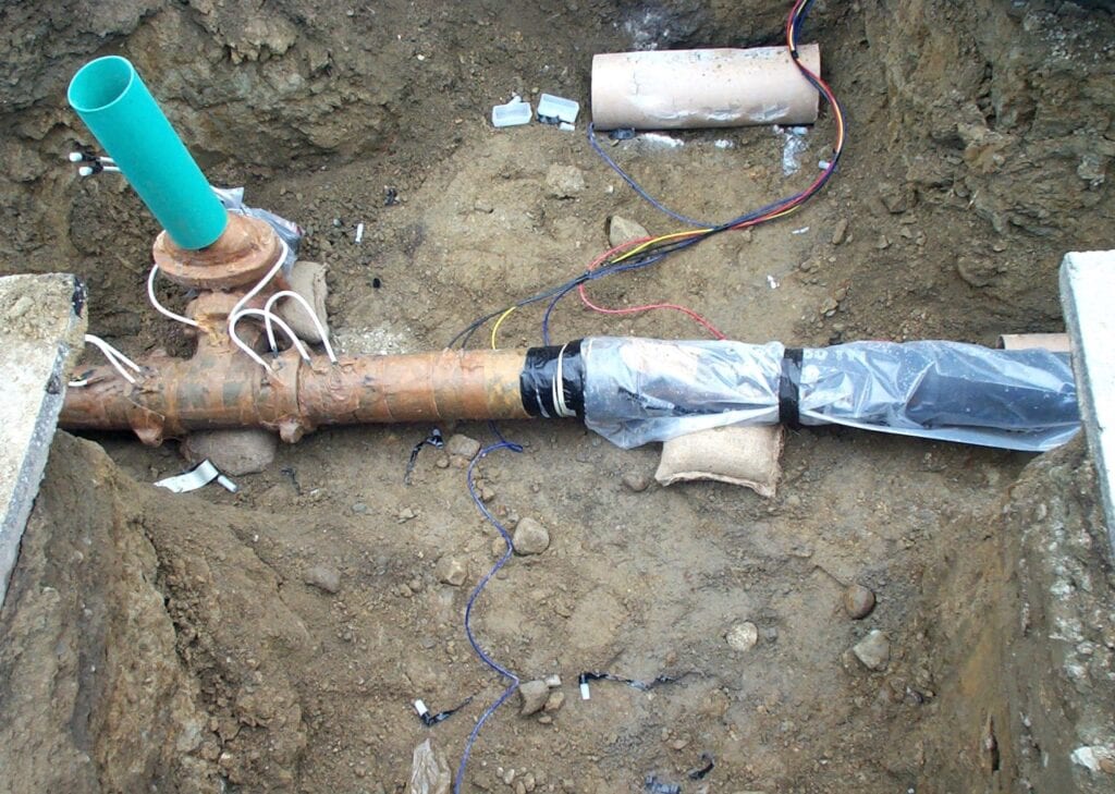Corroded pipe on ground